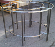 round stainless steel shiny table legs stand custom work from Myriad Metal Designs gallery