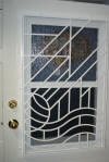 modern door security grill with an interesting pattern white Toronto residential installation image