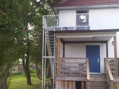 refinished metal balcony stairway and landing handrail exterior entrance image