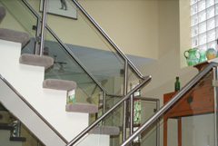 beautiful modern glass and stainless steel interior residential handrail from beautiful Toronto home project