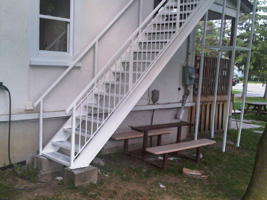 exterior staircase and landing catwalk refinishing project in Toronto area image after restoration complete